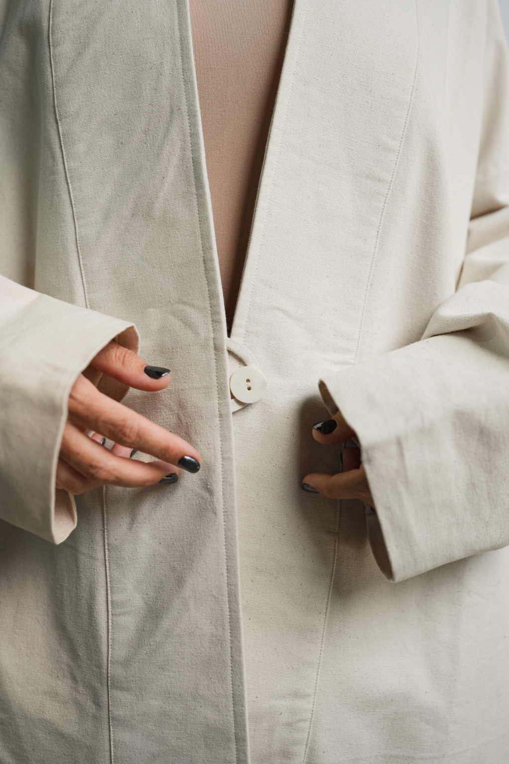 Handcrafted slow fashion garments designed for everyday wear using natural, breathable fabrics
