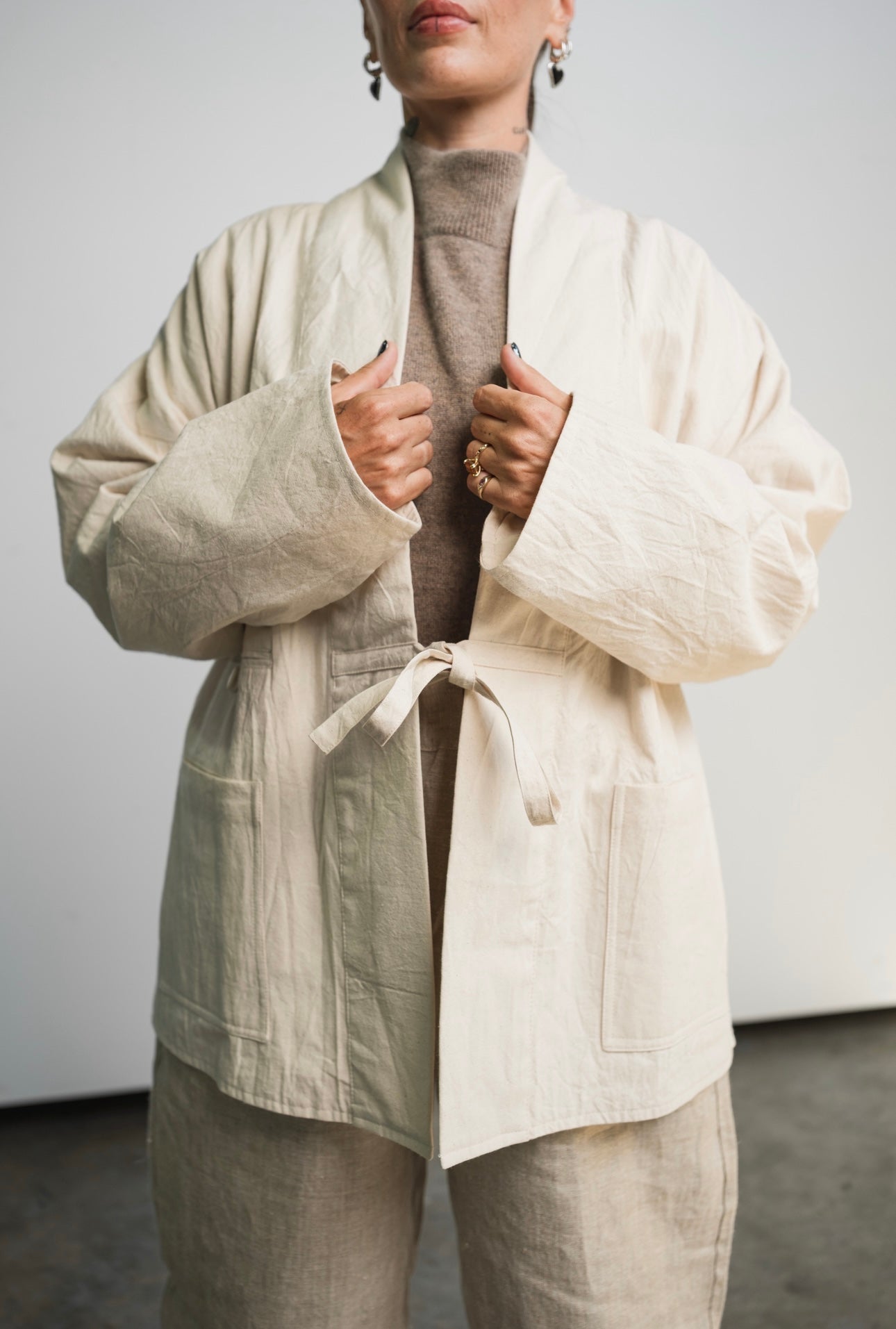 Unisex cotton canvas blazer jacket in undyed, unbleached fabric with three pockets and minimalist design