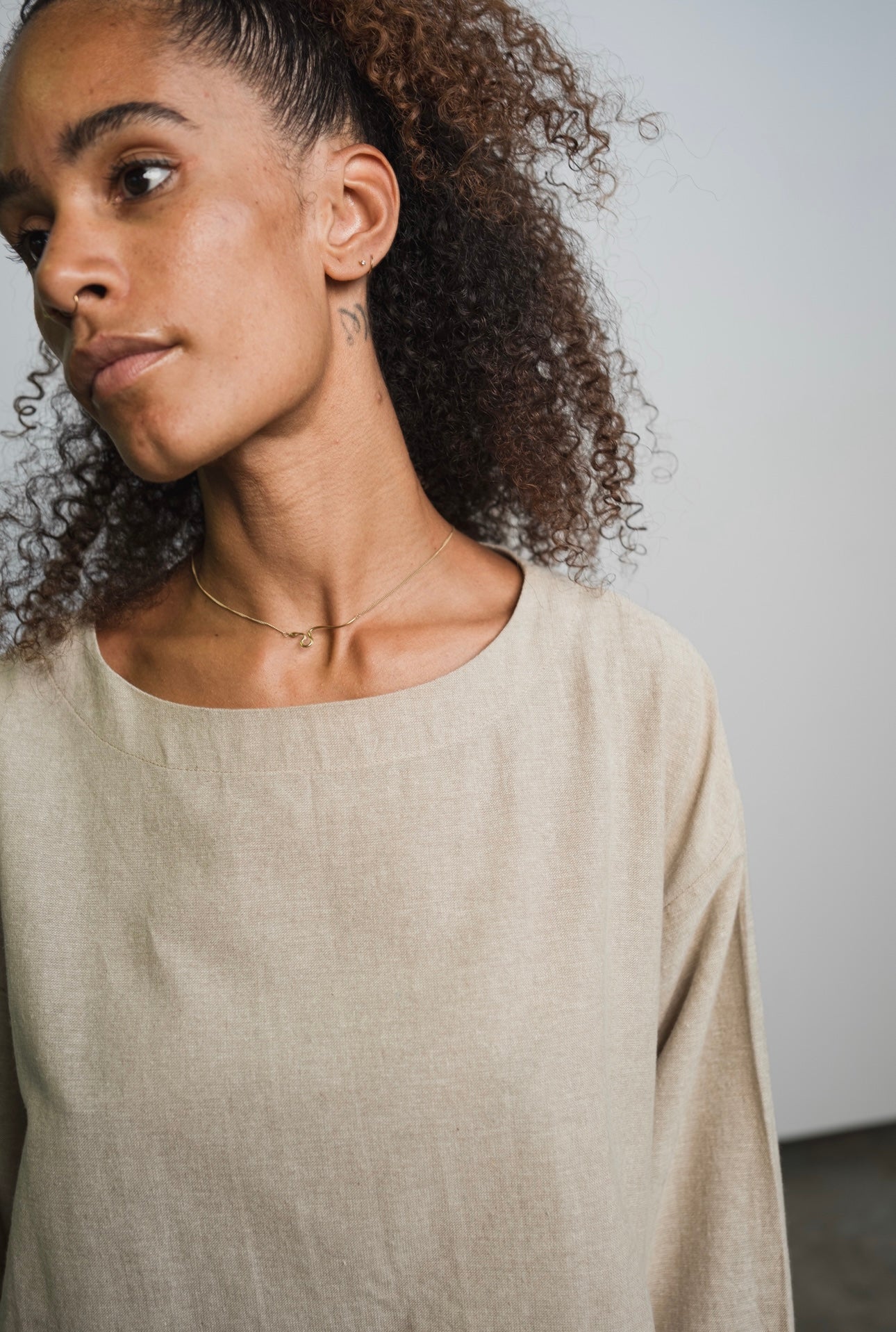 Ash organic handwoven cotton long sleeve top with oversized fit and round neckline
