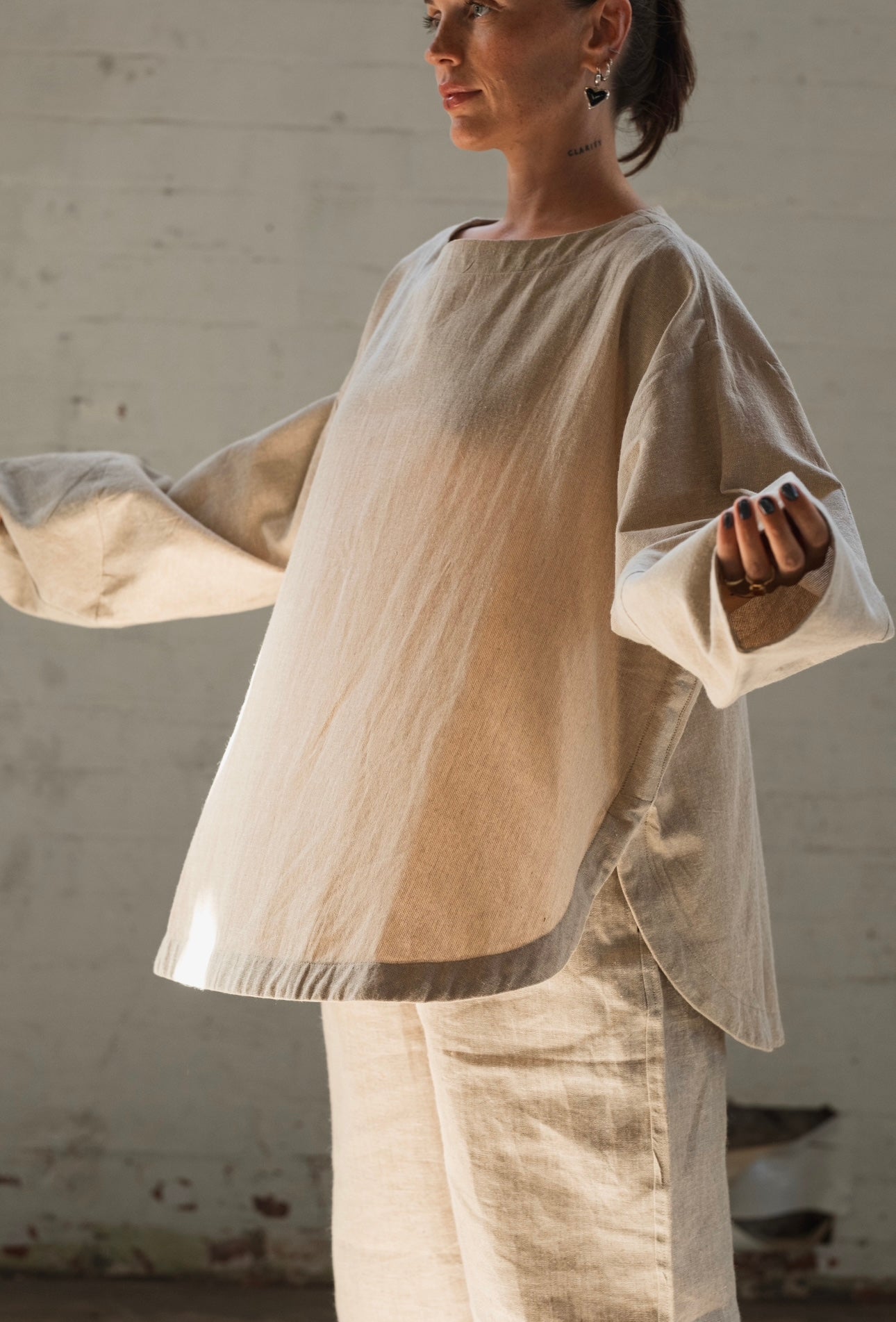 Ash organic handwoven cotton long sleeve top with oversized fit and round neckline
