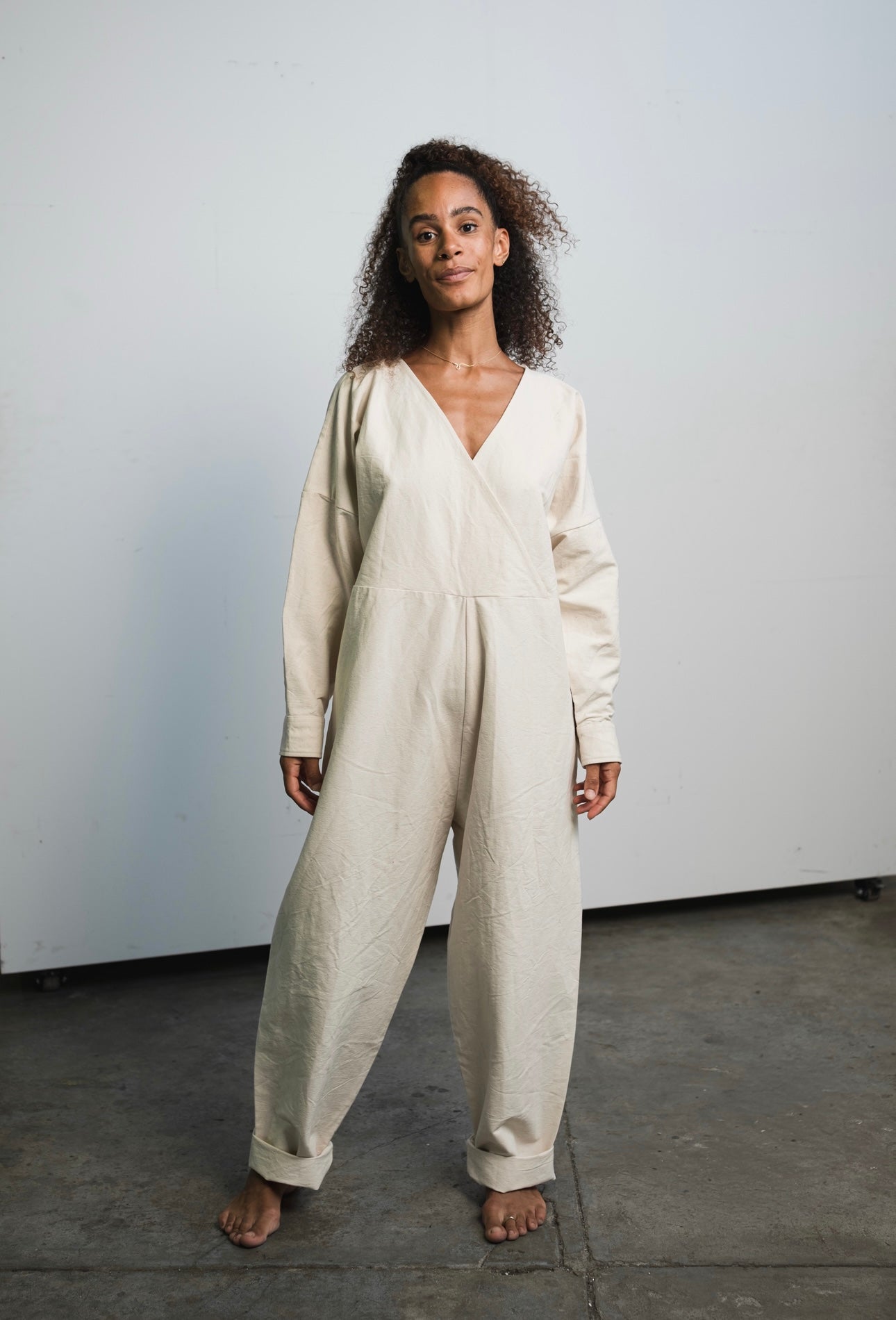 Oversized raw undyed cotton canvas jumpsuit with relaxed everyday fit
