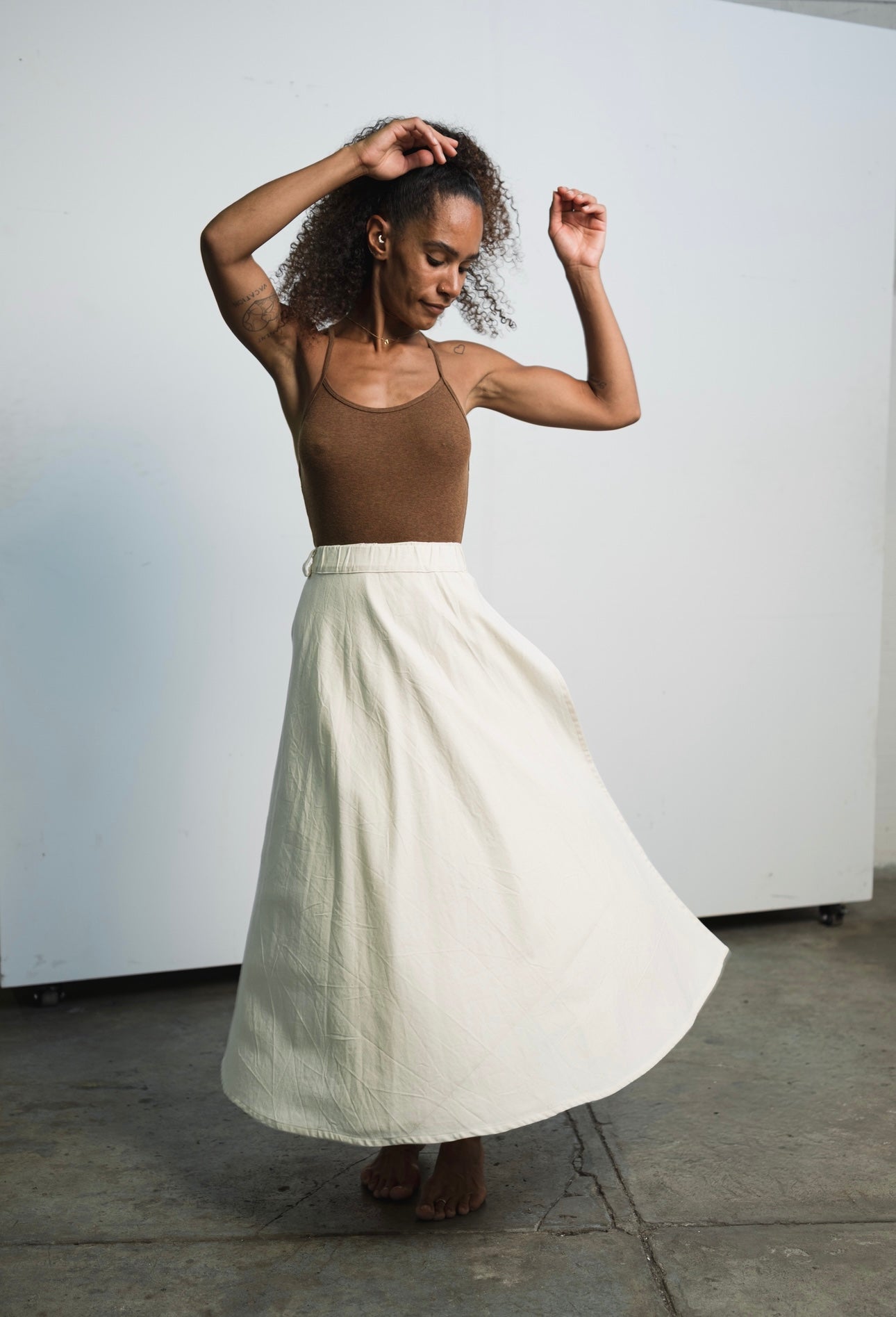 Cotton canvas skirt with elastic waistband, ribbon tie, and double-layer fabric
