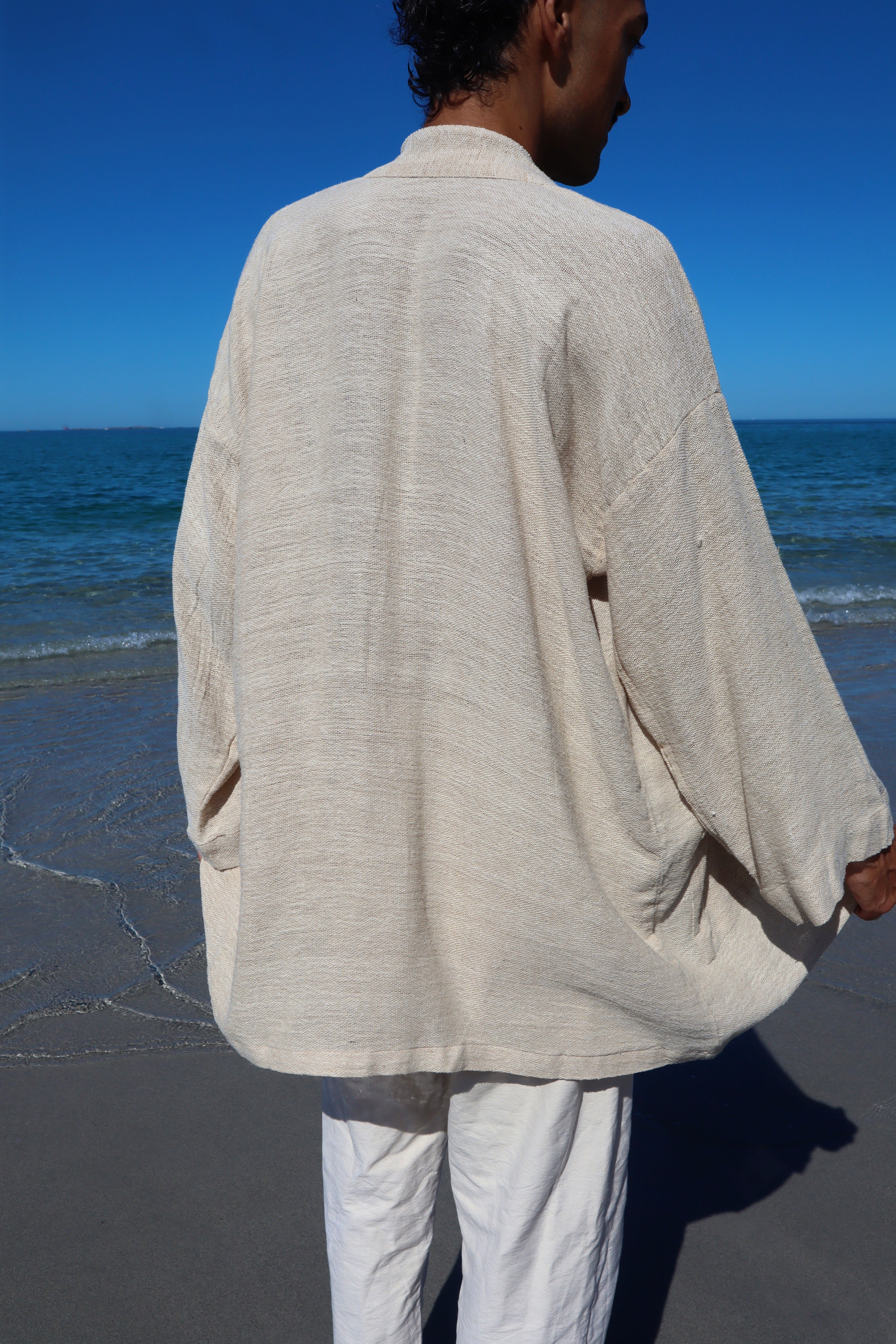 Gicha and noil silk garment in handspun basket weave fabric made from recycled silk
